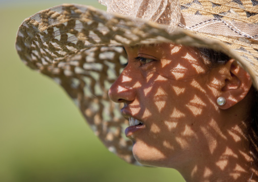 Woman with hat in anakena beach, Easter Island, Hanga Roa, Chile