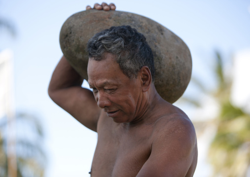 Stone competition at anakena beach during tapati festival, Easter Island, Hanga Roa, Chile