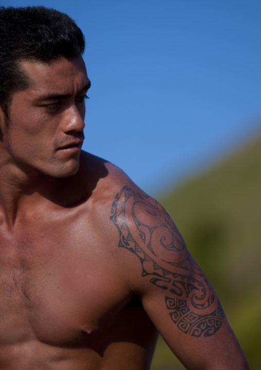 Tattooed man ready for canoe competition at anakena beach, Easter Island, Hanga Roa, Chile