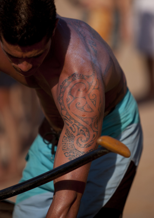 Tattooed man ready for canoe competition at anakena beach, Easter Island, Hanga Roa, Chile