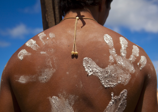 Back of a native man during spear competition at Tapati festival, Easter Island, Hanga Roa, Chile