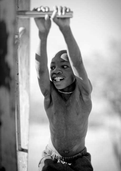 Mucawana Doing The Chore Of Fetching Water, Village Of Oncocua, Angola