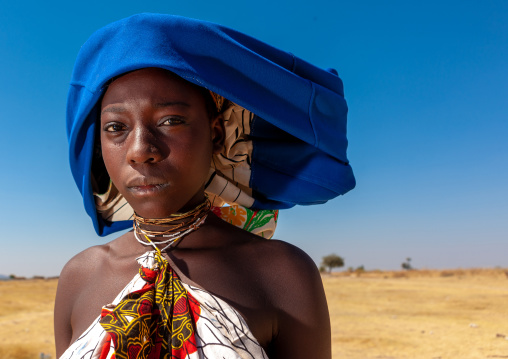 Mucubal tribe woman wearing a blue headwear, Namibe Province, Virei, Angola