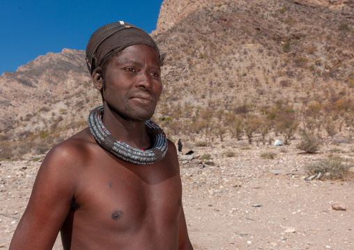 Himba tribe man with the traditional necklace, Cunene Province, Oncocua, Angola