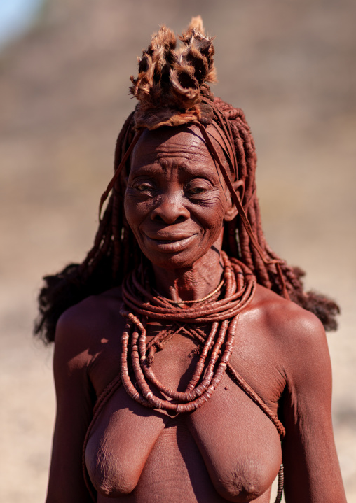 Portrait of a Himba tribe woman covered with otjize, Cunene Province, Oncocua, Angola