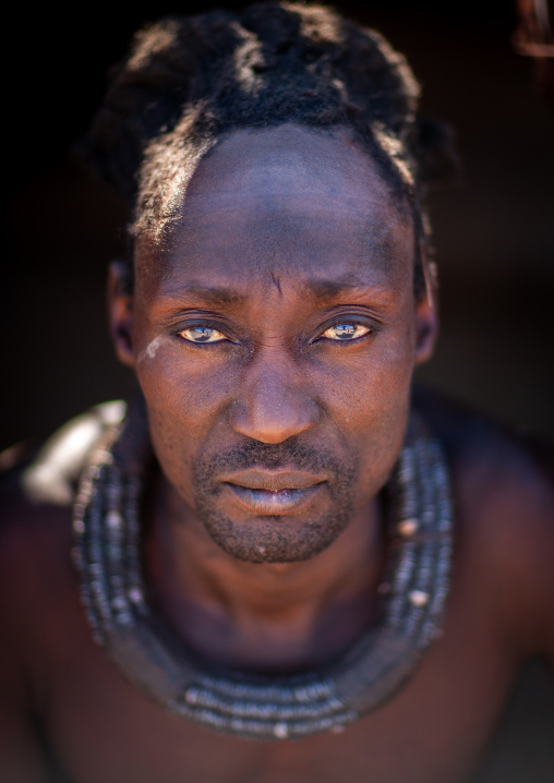 Himba tribe man with the traditional necklace, Cunene Province, Oncocua, Angola