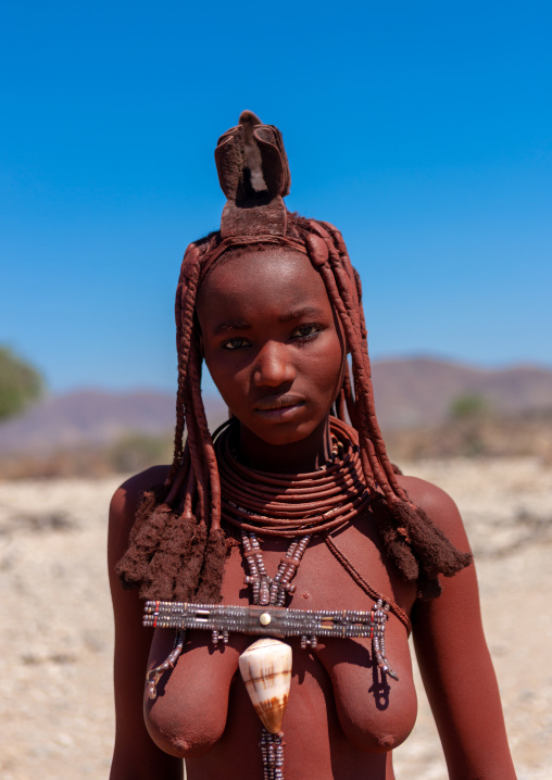 Portrait of a Himba tribe woman covered with otjize, Cunene Province, Oncocua, Angola