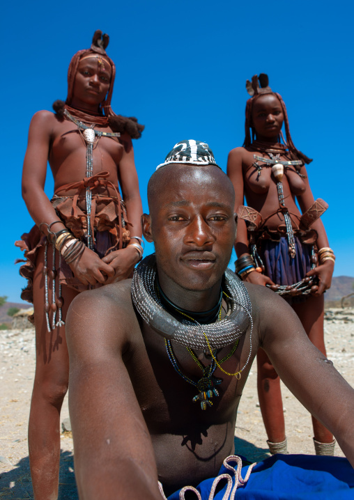 Himba tribe men and women, Cunene Province, Oncocua, Angola