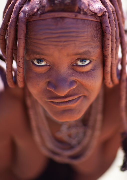 Portrait of a Himba tribe woman covered with otjize, Cunene Province, Oncocua, Angola