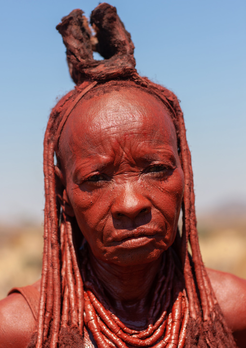 Portrait of a Himba tribe woman covered with otjize, Cunene Province, Oncocua, Angola