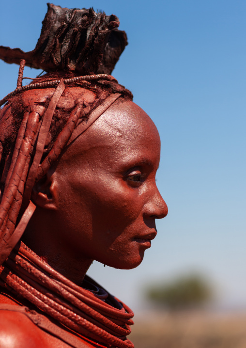 Portrait of a Himba tribe woman covered with otjize, Cunene Province, Oncocua, Angola