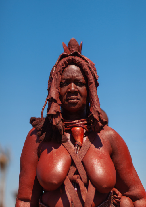 Portrait of a Himba tribe woman covered with otjize, Cunene Province, Oncocua, Angola