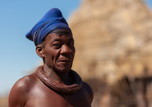 Portrait of a Himba tribe man with a traditional necklace, Cunene Province, Oncocua, Angola