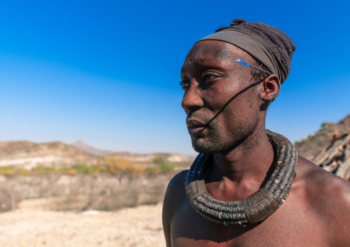 Portrait of a Himba tribe man, Cunene Province, Oncocua, Angola