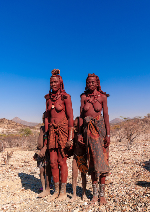 Himba tribe women covered with otjize, Cunene Province, Oncocua, Angola