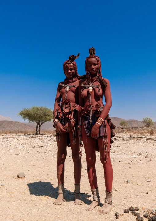 Himba tribe women covered with otjize, Cunene Province, Oncocua, Angola