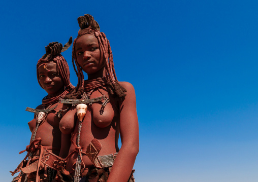 Himba tribe women covered with otjize, Cunene Province, Oncocua, Angola