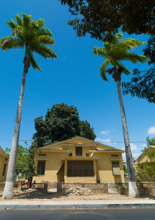 Old portuguese colonial house with palm trees, Namibe Province, Namibe, Angola