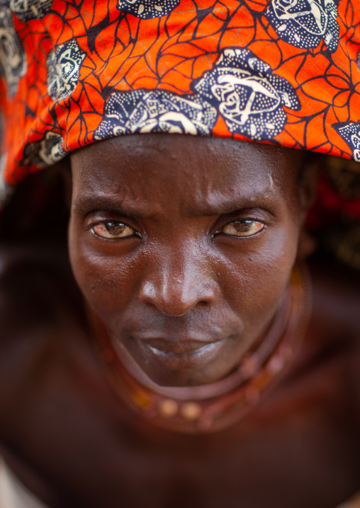 Portrait of a Mucubal tribe women wearing colorful headwears, Namibe Province, Virei, Angola