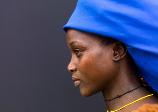 Mucubal tribe woman wearing a blue headwear, Namibe Province, Virei, Angola