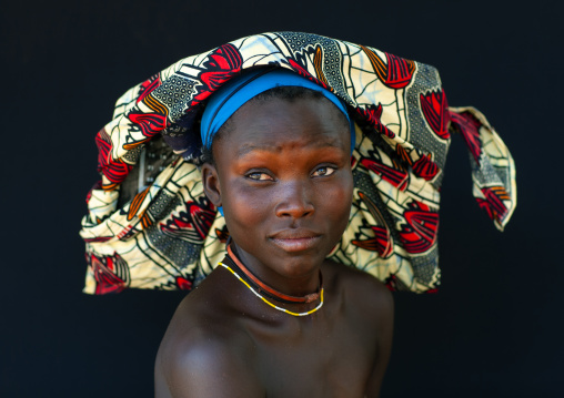 Portrait of a Mucubal tribe women wearing colorful headwears, Namibe Province, Virei, Angola