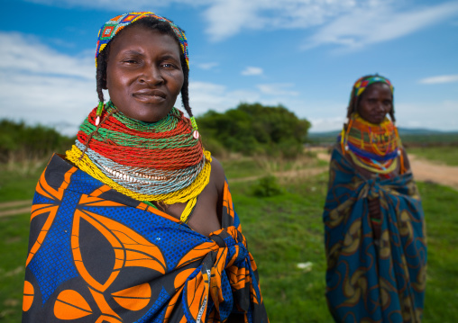 Mumuhuila tribe women in a field, Huila Province, Chibia, Angola