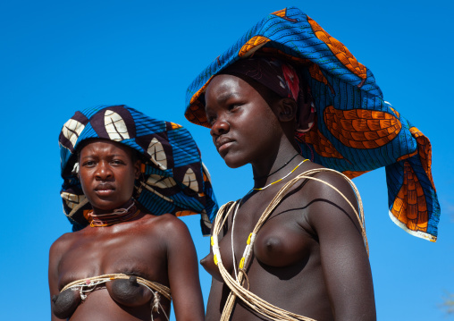 Portrait of a Mucubal tribe women wearing colorful headwears, Namibe Province, Virei, Angola