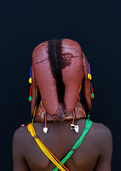 Rear view of Mumuhuila tribe girl hairstyle, Huila Province, Chibia, Angola