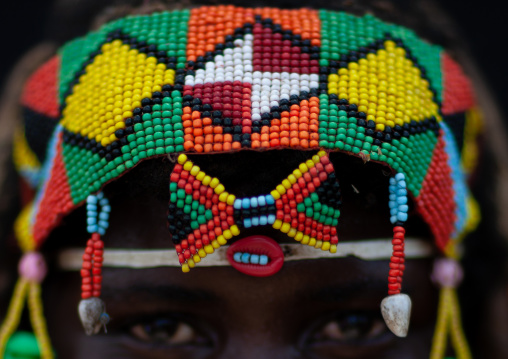 Mumuhuila tribe woman beaded headbang, Huila Province, Chibia, Angola