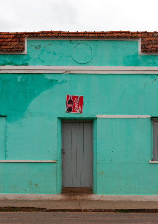 Old green portuguese colonial house, Bié Province, Chinguar, Angola