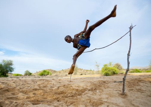 Mukubal Kid Doing High Jumping, Virie Area, Angola