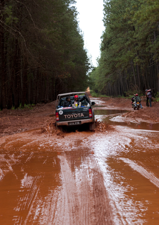 Women At The Back Of A Four Wheel Drive On A Muddy Road, Cusse Area, Angola