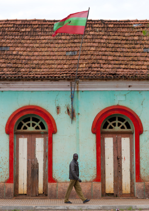 Man Passing By Unita Headquarters In Chinguar, Angola