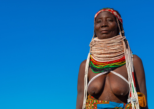 Handa tribe woman with huge beaded necklaces, Huila Province, Hoque, Angola