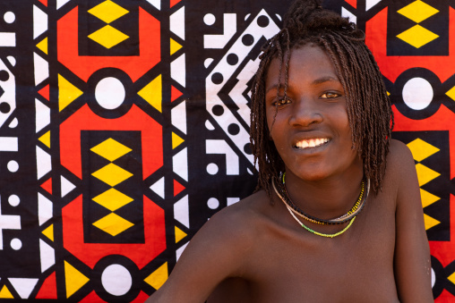 Smiling batwa tribe young woman who will soon be married, Cunene Province, Oncocua, Angola