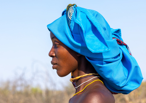 Portrait of a mucubal tribe woman with a blue headwear, Namibe Province, Virei, Angola