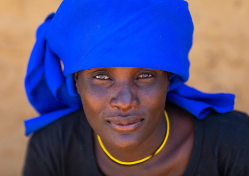 Cuepe tribe woman with a blue headwear, Cunene Province, Curoca, Angola