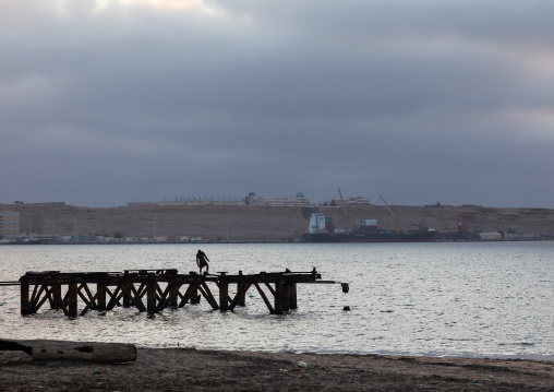 Damaged jetty on praia das Miragens, Namibe Province, Namibe, Angola