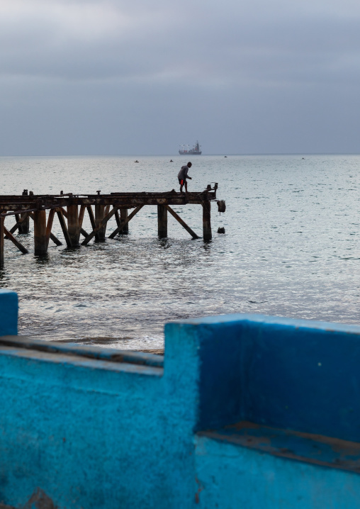 Damaged jetty on praia das Miragens, Namibe Province, Namibe, Angola