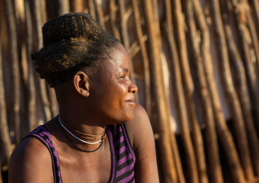 Nguendelengo tribe woman with the traditional bun hairstyle, Namibe Province, Capangombe, Angola