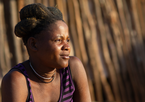 Nguendelengo tribe woman with the traditional bun hairstyle, Namibe Province, Capangombe, Angola