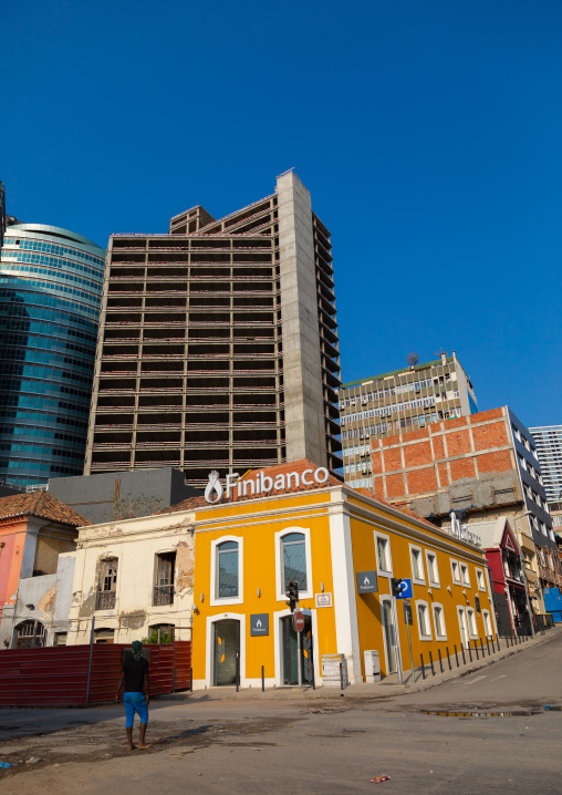 Old portuguese colonial building in front of a new skyscraper, Luanda Province, Luanda, Angola