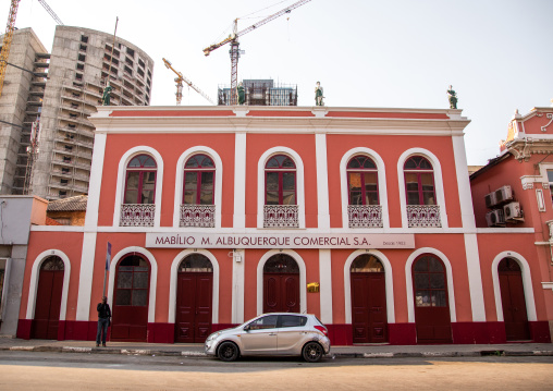 Old portuguese colonial building in front of a new skyscraper, Luanda Province, Luanda, Angola