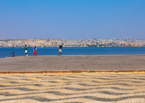 Men fishing on the jetty, Benguela Province, Lobito, Angola