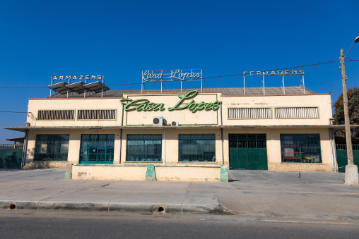 Old portuguese colonial building hosting casa Lopes shop, Benguela Province, Lobito, Angola