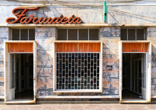 Old portuguese colonial building hosting a pharmacy, Namibe Province, Namibe, Angola