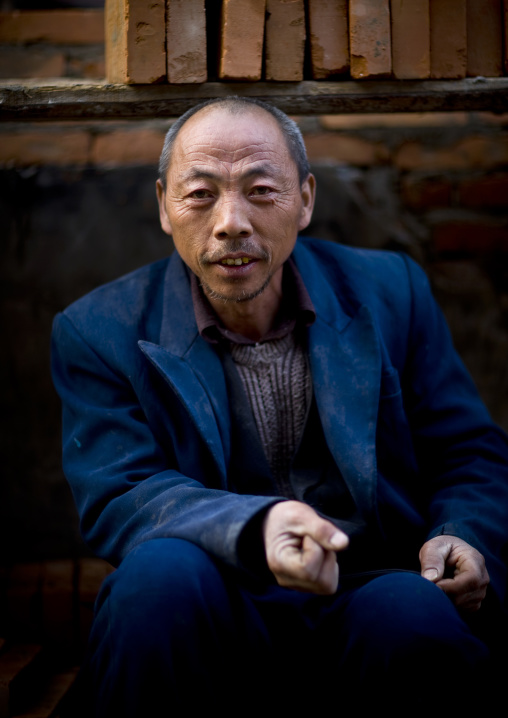 Chinese Worker With Blue Suit, Beijing China