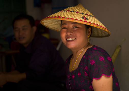 Woman With A Chinese Hat, Menglun, China