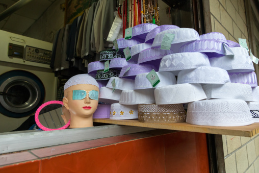 Muslim caps for sale in a shop, Qinghai province, Xining, China