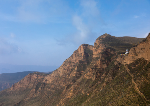 Stupa on a cliff in Shachong monastery, Qinghai Province, Wayaotai, China